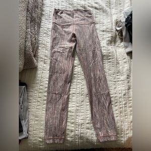 Lululemon size 4 patterned light pink leggings